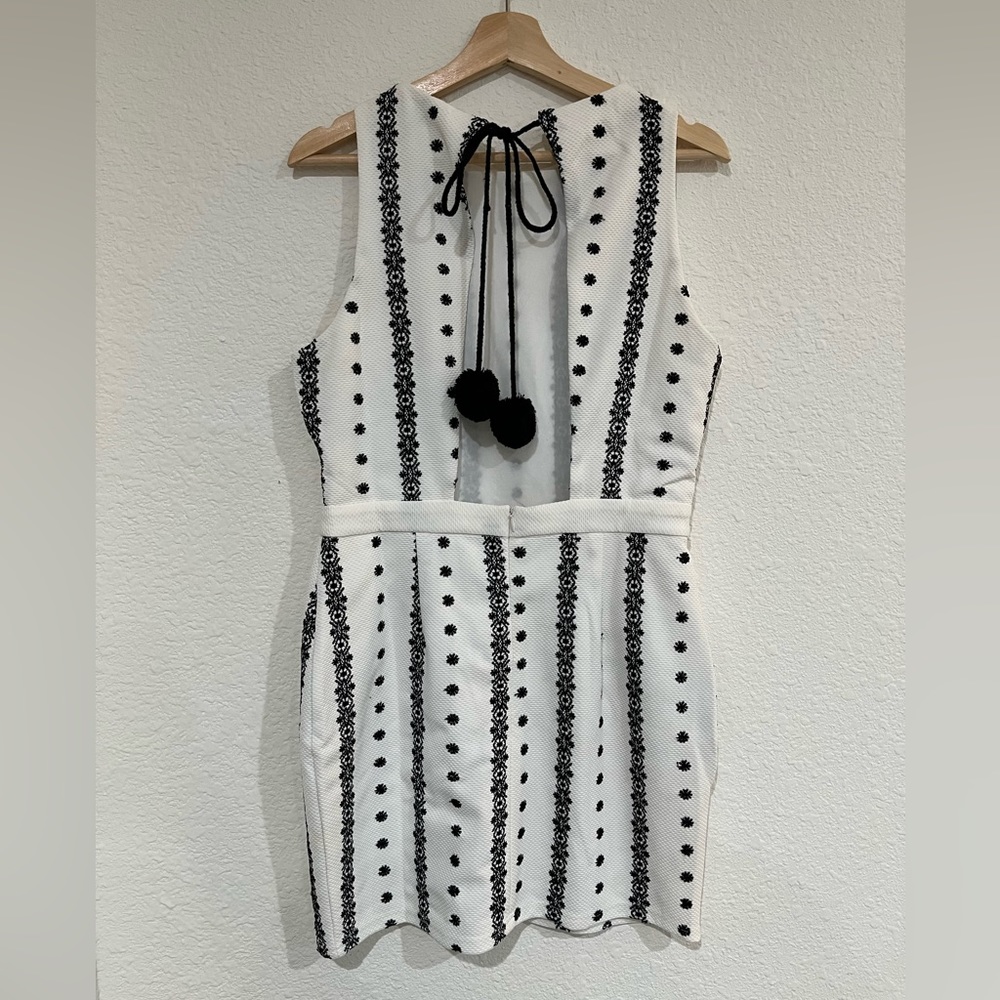 Adorable Backless Mini Dress with Pom Poms